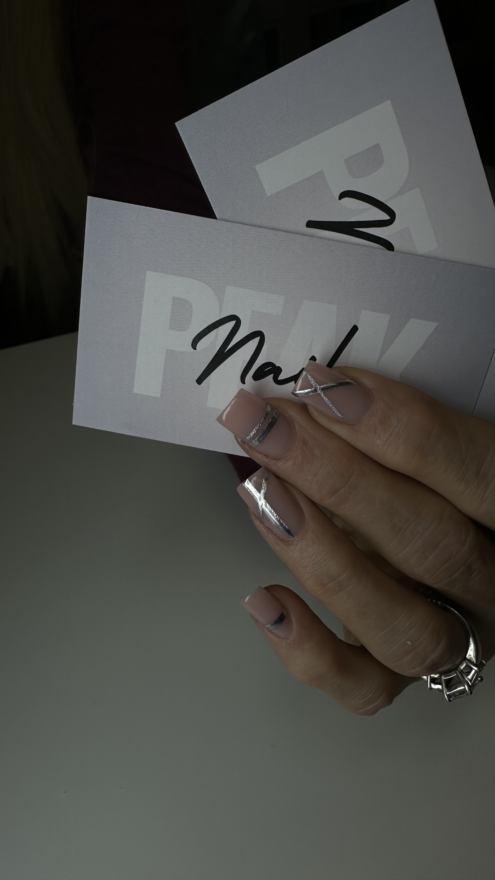 Peak Nails logo
